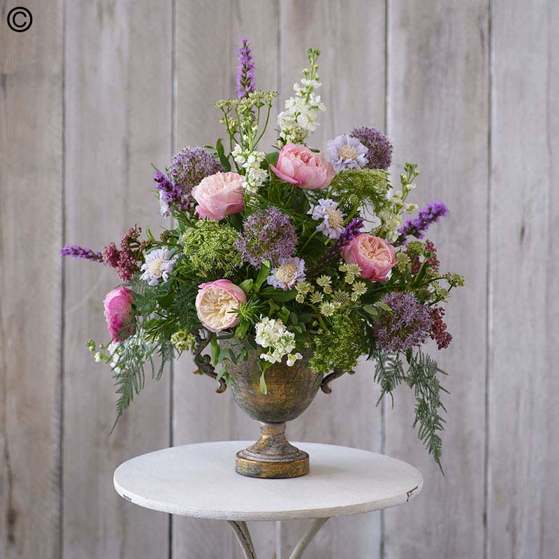 Service arrangement tribute made with the finest flowers